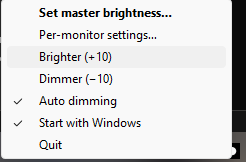 Nitpicker system tray right-click menu with master brightness, per-monitor settings, brighter and dimmer, auto dimming, and start with Windows